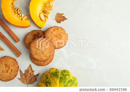 Pumpkin cookies on white textured background, space for text Pumpkin cookies on white textured background, space for text 89441596