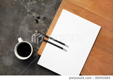 Blank paper, pencils, coffee cup Blank paper, pencils, coffee cup 89443064