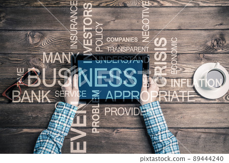 Close view of woman in checked shirt at her workplace 89444240