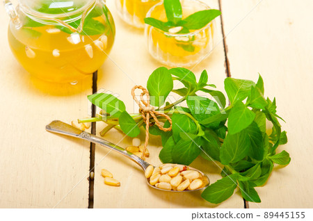 Arab traditional mint and pine nuts tea 89445155