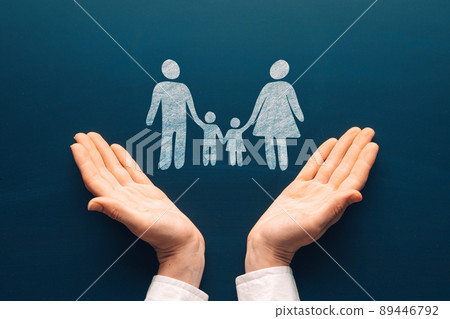 Family life care insurance concept. Female tender hands with a family symbol drawing on chalkboard 89446792