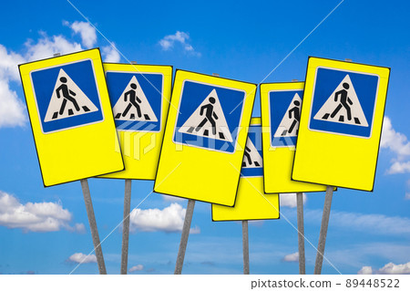 Pedestrian crossing signs on  sky background 89448522