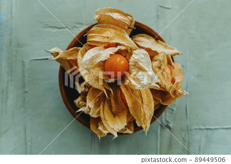 some groundcherries with their husks 89449506