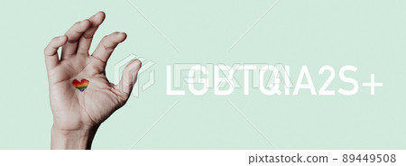 heart-shaped rainbow flag and text LGBTQIA2S+ heart-shaped rainbow flag and text LGBTQIA2S+ 89449508