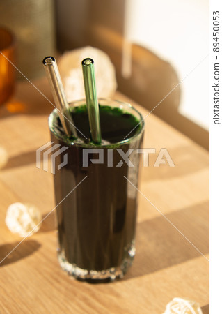 Blue-green algae Chlorella and spirulina powder. Super powder. Natural supplement of algae. Detox superfood drink cocktail. Food supplement source of protein and beta carotene 89450053