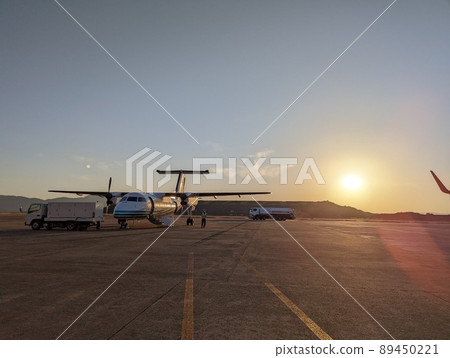 Airport and Cessna at sunset Airport and Cessna at sunset 89450221