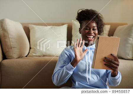 Excited Woman Videocalling Friend 89450857