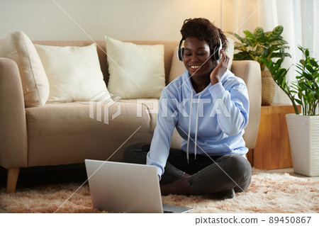 Woman Listening to Great Song Woman Listening to Great Song 89450867