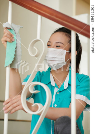 Maid Cleaning Railing 89451302