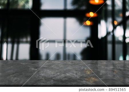 Vintage loft stone table top on blur interior coffee cafe.	 89451565