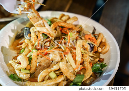 Thai food tradition style, Crispy pork spicy salad in foodtruck event. Thai food tradition style, Crispy pork spicy salad in foodtruck event. 89451705