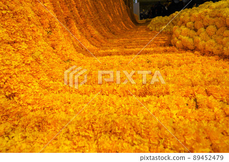 Marigold arrangement to flower steering and mobile to decorate event / festival for photo shooting or backdrop and background in Flower Market, Thailand. 89452479