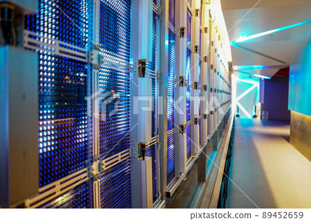 LED pattern system on the mirror glass wall from inside the building to outside with escalator. LED pattern system on the mirror glass wall from inside the building to outside with escalator. 89452659