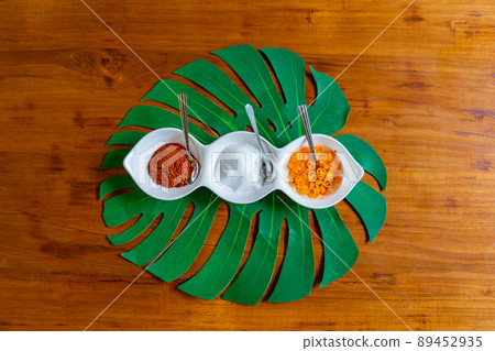 Asia flavoring in the liitle white bowl such as vinegar sugar and chilli fot a kind of noodle Thai style. Asia flavoring in the liitle white bowl such as vinegar sugar and chilli fot a kind of noodle Thai style. 89452935