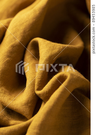 Texture with linen fabric in mango color 89453985