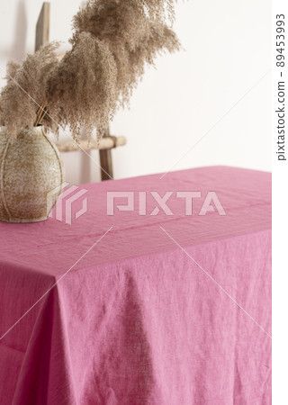 Home decor concept, table with pink tablecloth Home decor concept, table with pink tablecloth 89453993