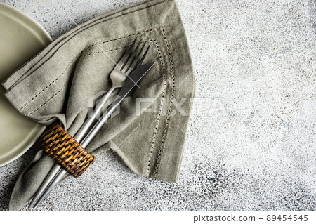 Table setting on concrete background Table setting on concrete background 89454545