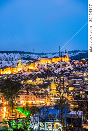 Snowing in Tbilisi city in the evening 89454567