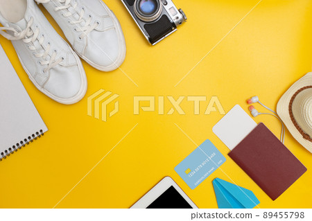 Travel set lies diagonally on a yellow background Travel set lies diagonally on a yellow background 89455798