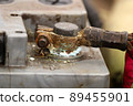 Car battery terminal covered with oxide. Car repair. Battery replacement. 89455901