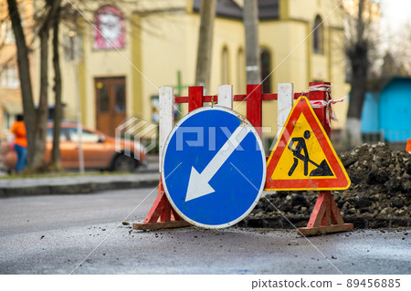 Warning street sign on road work site. Warning street sign on road work site. 89456885