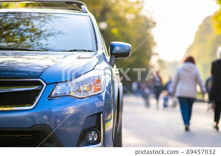 New clean car parked on a city street side. New clean car parked on a city street side. 89457032
