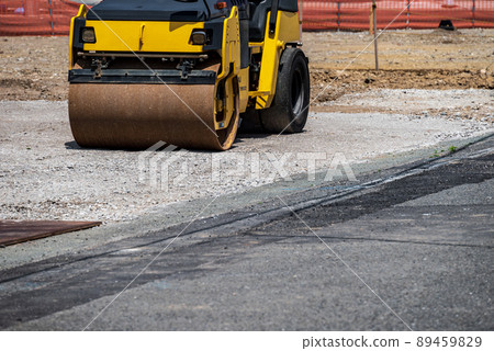 Construction site vibrating rollers and road construction 89459829