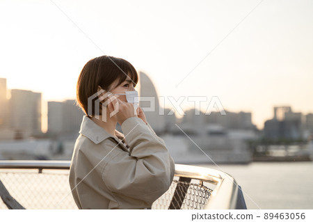 A woman wearing a mask 89463056