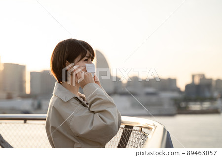 A woman wearing a mask 89463057