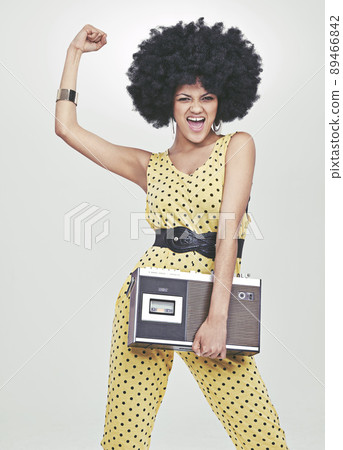 Stepping out with her tunes - 70s style 89466842