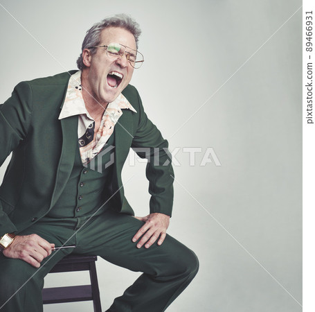 Loosening up. A mid-adult shouting in the studio. Loosening up. A mid-adult shouting in the studio. 89466931