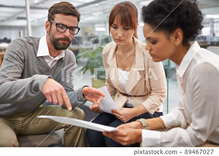 I like this point here.... Shot of a diverse group of young professionals discussing paperwork. I like this point here.... Shot of a diverse group of young professionals discussing paperwork. 89467027