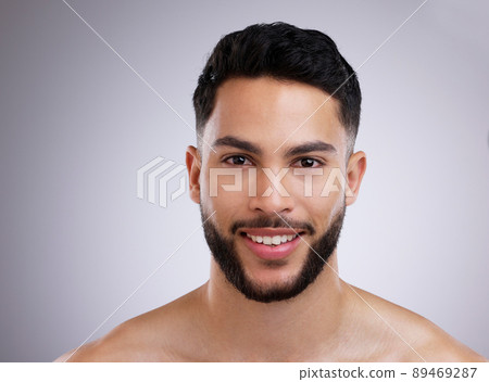 Feeling fierce fresh and clean. Shot of a young man against a studio background. 89469287