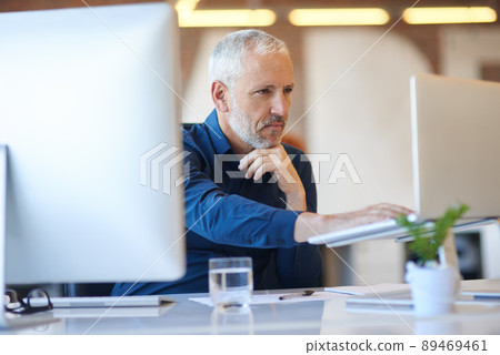 Working toward career goals. Cropped shot of businesspeople in the office. 89469461
