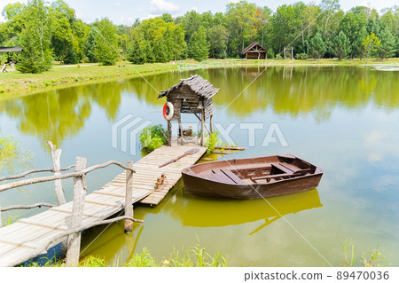 A small boat dock on the lake.  89470036