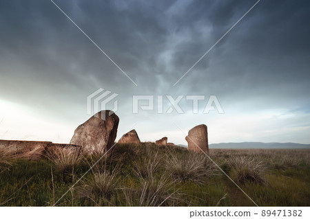 idols stones in the steppe of Khakassia, a historical cultural religious mystical place of power in the Khakass steppe 89471382