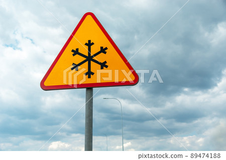 Road sign warning of road frosting, snowflake 89474188