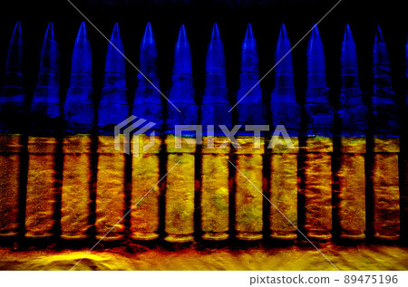bullets on wall ukraine flag 89475196