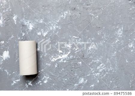 Flat lay composition with empty toilet paper rolls and space for text on color background. Recyclable paper tube with metal plug end made of kraft paper or cardboard 89475586