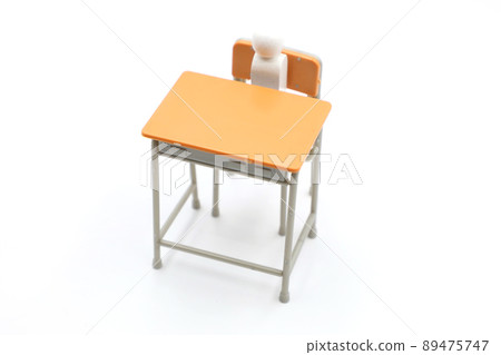 People sitting in school chairs and school desks People sitting in school chairs and school desks 89475747