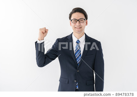 Businessman guts pose Businessman guts pose 89478378