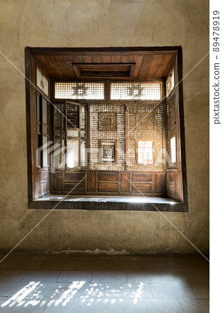 Interleaved wooden window (Mashrabiya) with built-in couch Interleaved wooden window (Mashrabiya) with built-in couch 89478919
