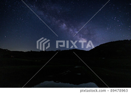 The Milky Way seen in the rice paddies in the west of Ohaganishi in Misaki Town, Okayama Prefecture, Japan The Milky Way seen in the rice paddies in the west of Ohaganishi in Misaki Town, Okayama Prefecture, Japan 89478963