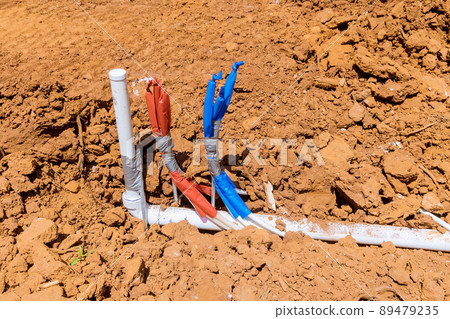 Plumbing work of assembling system laying from the ground of sanitary pvc sewage pipes Plumbing work of assembling system laying from the ground of sanitary pvc sewage pipes 89479235