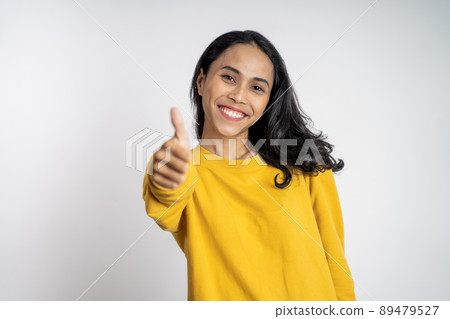 woman stand with thumbs up on isolated background woman stand with thumbs up on isolated background 89479527