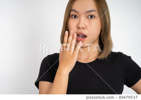 woman feeling shocked and suprised over isolated background woman feeling shocked and suprised over isolated background 89479537