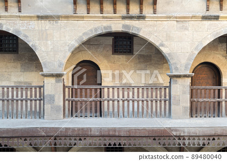 Front view of three arches with interleaved wooden balustrades Front view of three arches with interleaved wooden balustrades 89480040