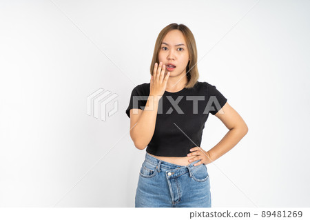 woman feeling shocked and suprised over isolated background 89481269