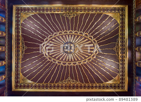 Wooden golden ornate ceiling with design based on sun rays inspired by the old flag of the ottoman empire, Cairo, Egypt 89481389