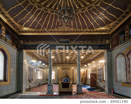 Interior of public mosque of Manial Palace of Prince Mohammed Ali Tewfik with wooden golden ornate ceilings, Cairo, Egypt Interior of public mosque of Manial Palace of Prince Mohammed Ali Tewfik with wooden golden ornate ceilings, Cairo, Egypt 89481390